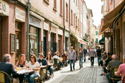 Rue animée d'un quartier populaire de Toulouse avec ses bâtiments en briques roses et ses habitants au quotidien